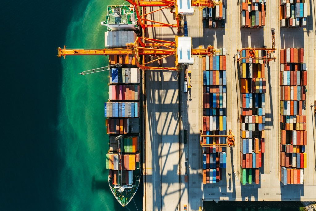 containers-in-international-shipping-dock-waiting-to-import-or-export-and-transportation-top-view-1-1024x682